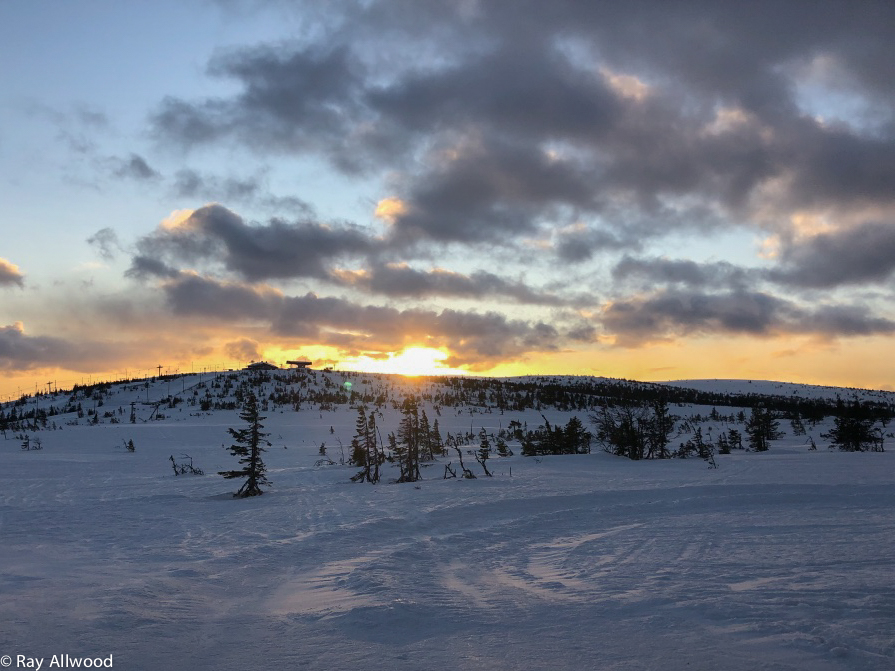 Winter sun descends below the horizon